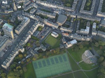 Oblique aerial view centred on Meadow Lane with Buccleuch Street adjacent, taken from the SW.
