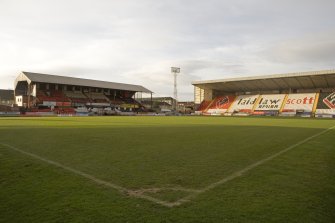 View of St Mirren Park from pitchside, showing the Main (south) and Caledonia Street (west) stands