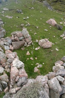 Eilean nan Caorach, fort, view from NW of a hut within the fort NC37SE 1.