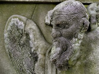Detail of sculpture on monument located near to the entrance of Calton Old Burial Ground.
