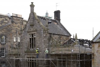 Detail of central gable and fire damaged roof on north elevation of former St John's Church, taken from NW on Victoria Terrace