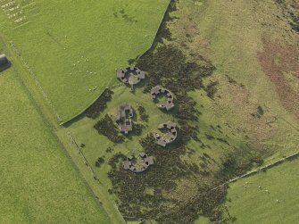 Oblique aerial view centred on the gun emplacments, taken from the NE.
