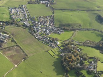 General oblique aerial view centred on the village, taken from the WNW.