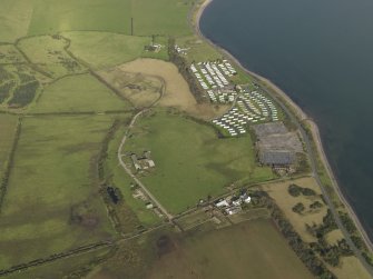 Oblique aerial view centred on the main aircraft repair area, taken from the S.