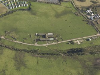 Oblique aerial view centred on the main aircraft repair area, taken from the W.