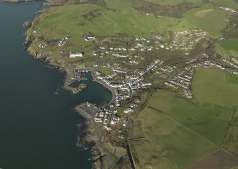 General oblique aerial view centred on the village, taken from the S.