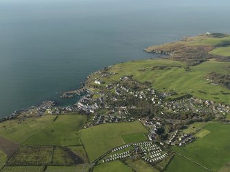 General oblique aerial view centred on the village, taken from the SE.