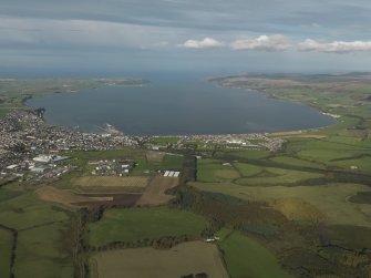 General oblique aerial view centred on the town with Loch Ryan adjacent, taken from the S.