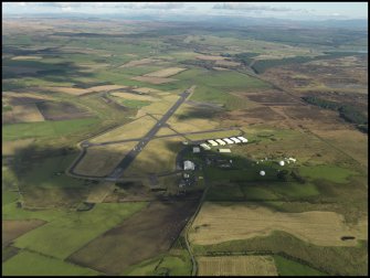 Oblique aerial view centred on the airfield, taken from the SW.