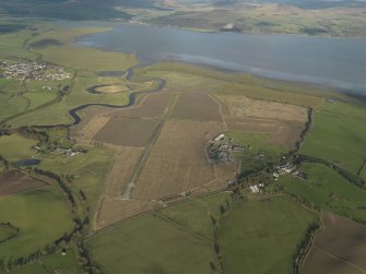 General oblique aerial view centred on the airfield, taken from the SW.