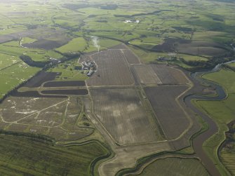 General oblique aerial view centred on the airfield, taken from the NE.