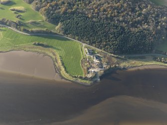 Oblique aerial view centred on the saw mill with the remains of the former Air Sea rescue yard adjacent, taken from the E.