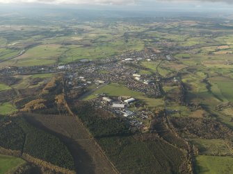 General oblique aerial view centred on the airfield, taken from the ESE.