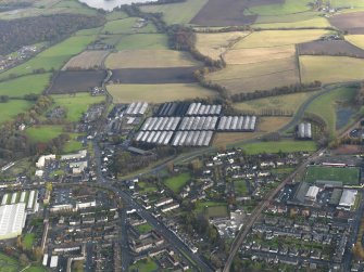General oblique aerial view centred on the bonded warehouses, taken from the WSW.