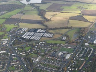General oblique aerial view centred on the bonded warehouses, taken from the SW.