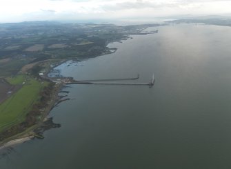 General oblique aerial view of the ammunition depot with the pier and jetty adjacent, taken from the W.