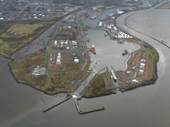 General oblique aerial view centred on the docks, taken from the NNE.