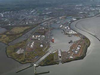 General oblique aerial view centred on the docks, taken from the N.