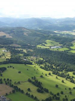 General oblique aerial view of the policies of Drummond Castle, taken from the SE.