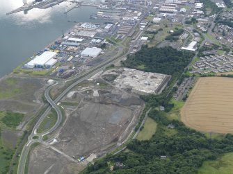 General oblique aerial view of Rosyth Europarc and HM Dockyard, taken from the ESE.