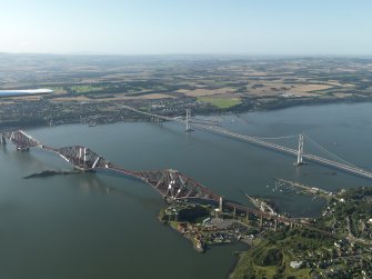 Oblique aerial view centred on the Forth Bridge with the Forth Road Bridge adjacent, taken from the NE.