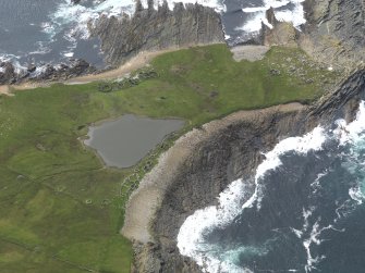 Oblique aerial view centred on 'The Tarf', taken from the NNE.