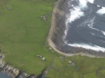 Oblique aerial view centred on the remains of the township, taken from the ENE.