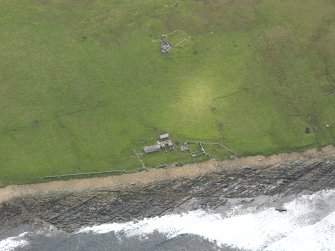 Oblique aerial view centred on the farmstead, taken from the NW.