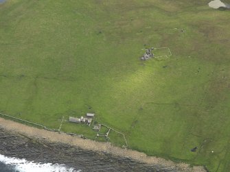 Oblique aerial view centred on the farmstead, taken from the W.