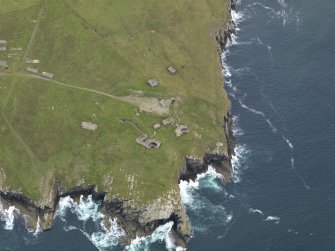 Oblique aerial view centred on the Hoxa Head (WW I and WW II) coastal batteries, taken from the W.