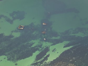 Oblique aerial view centred on the wreck, taken from the NW.