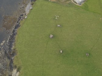 Oblique aerial view centred on the coastal gun battery, taken from the NE.