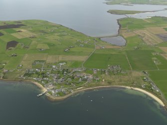 Oblique aerial view centred on the village, taken from the SSE.