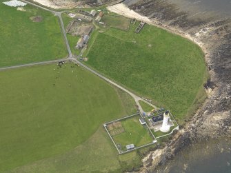 General oblique aerial view centred on the lighthouse, taken from the SE.