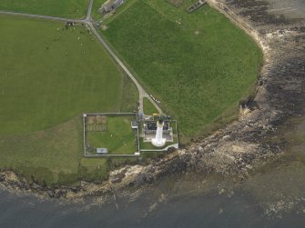 Oblique aerial view centred on the lighthouse, taken from the E.