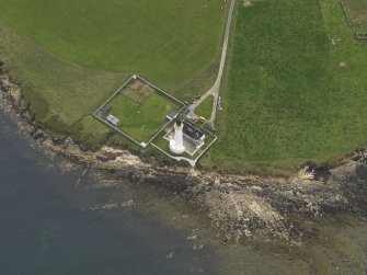 Oblique aerial view centred on the lighthouse, taken from the NE.