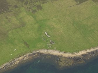 Oblique aerial view centred on the house and farmstead, taken from the WNW.