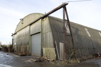 View from south east looking towards front elevation of 'hangar' building (NO 97333 68419), originally pattern store.