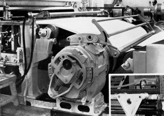 Copy of photograph of paper making machine (no.6), 'MILLSPAUGH' Suction Couch Roll and adjustable blow roll. To facilitate wire changing, the breast and guide rolls area arranged to be carried by removable light alloy brackets on top of the couch roll housing, these being cantilevered while the new wire is placed in position and the breast roll returned to its orginal position by the overhead crane. The Dandy is of the driven type and is electronically controlled, from the JB&S Machine 161 catalogue, James Bertram and Son Ltd, Leith Walk, Edinburgh, circa 1953. The catalogue describes and illustrates some of the features of the No 161 machine 'recently installed at the well known Mill of Guard Bridge Paper Co Ltd, Fife , Scotland designed with the co-operation of the Mill Staff especially for the economical production of the highest quality papers...'