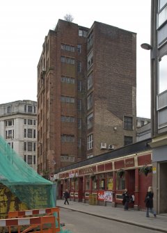View of 50 Argyle Street/3 Miller Street building, looking S down Miller Street