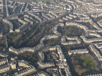 General oblique aerial view centred on the New town Crescents and Gardens built on the former Moray Estate, taken from the S.