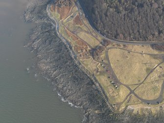 Oblique aerial view centred on the anti tank blocks, taken from the WSW.