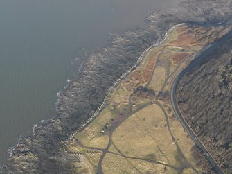 Oblique aerial view centred on the anti tank blocks, taken from the SW.