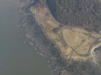 Oblique aerial view centred on the anti tank blocks, taken from the WSW.