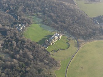 Oblique aerial view centred on the country house, taken from the NNW.
