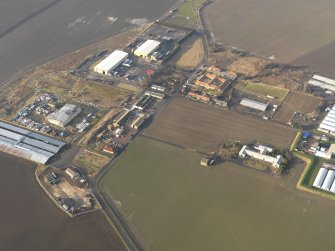 Oblique aerial view centred on the technical area, taken from the SE.