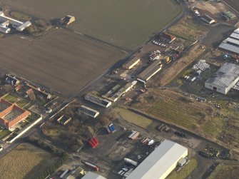 Oblique aerial view centred on the technical area, taken from the NW.