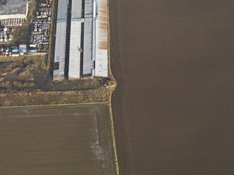 Oblique aerial view centred on the pillbox, taken from the SW.