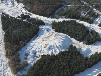 Oblique aerial view of the remains of the colliery bing, taken from the NNE.