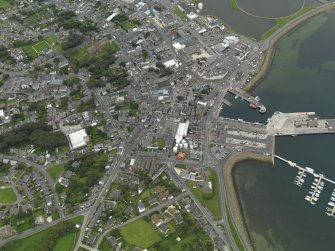 General oblique aerial view centred on the town, taken from the NE.